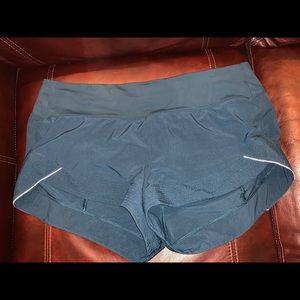 Lululemon Teal In Movement shorts size 12